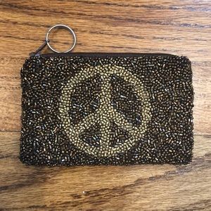 Brown peace sign Moyna change purse